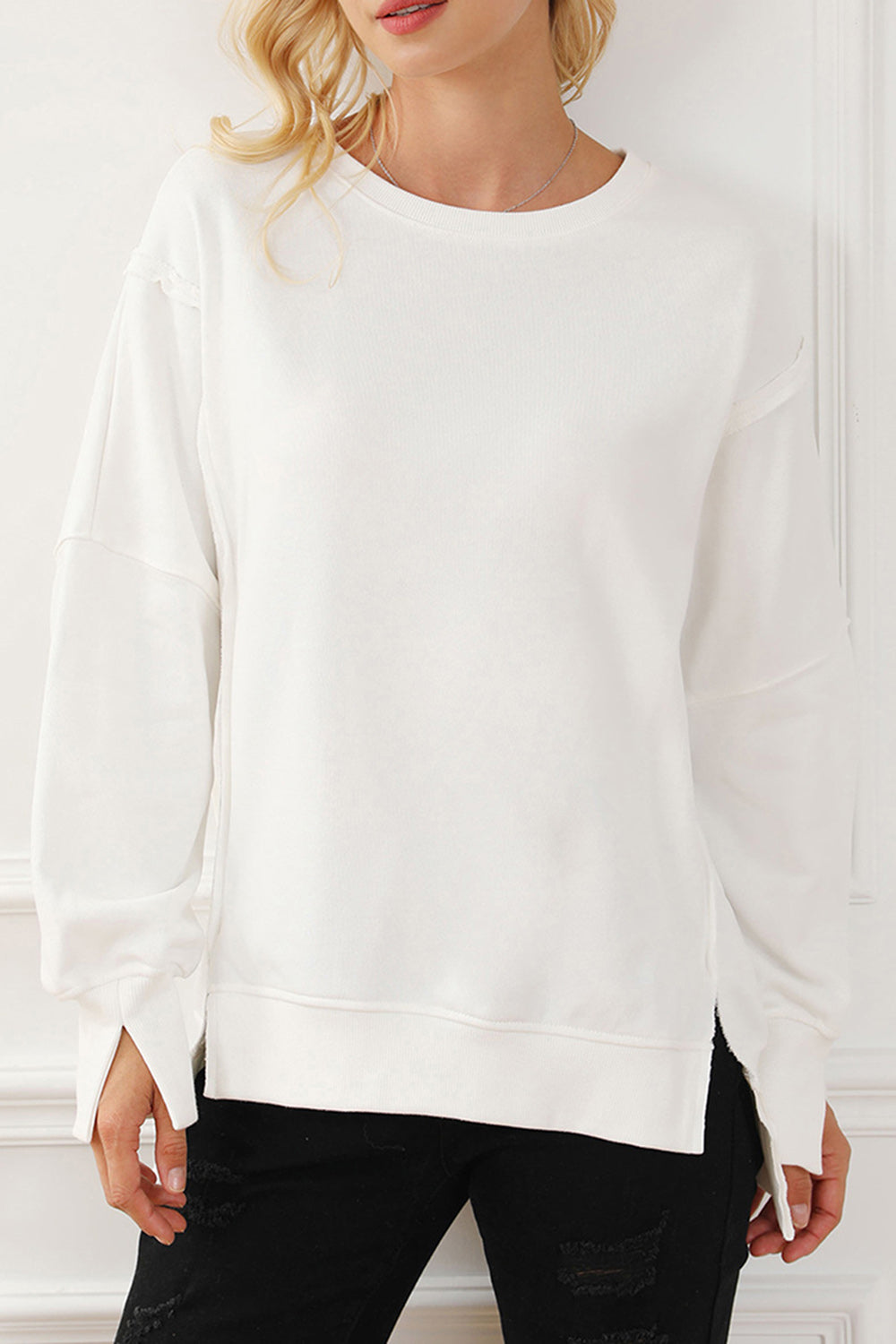 Exposed Seam High-Low Long Sleeve Sweatshirt